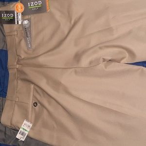 Men's Izod golf / casual pants. Waist 34 length 32. Brand new- 1-khaki, 1-black